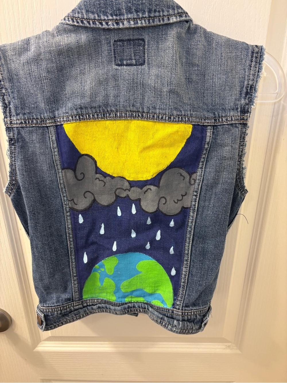 American Eagle Blue denim vest with a distressed look, size S